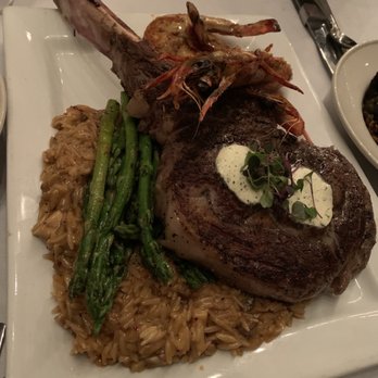 Queenie's Steakhouse - 32oz Wagyu Tomahawk - Steakhouses Near Me - Denton, Texas