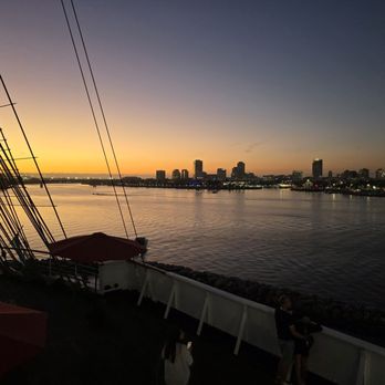 The Queen Mary - Looking towards the bow from the Observation bar during sunset. - Hotels Near Me - Long Beach, California The Queen Mary - Looking towards the bow from the Observation bar during sunset. - Hotels Near Me - Long Beach, California