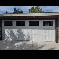All In One Garage Doors - Amar garage door 18x7 looks very beautiful makes the house look like a million dollar home.