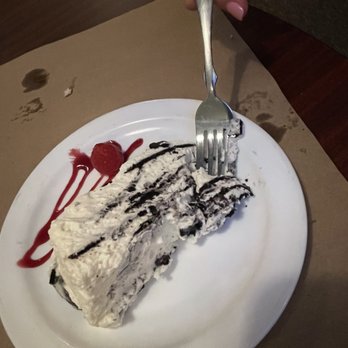 Pulaski Street Grille - a piece of cake on a plate with a fork - American Near Me - Riverhead, New York