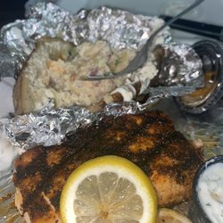 Tom's Grille - My first time dining here. Grilled Salmon with a loaded baked potato