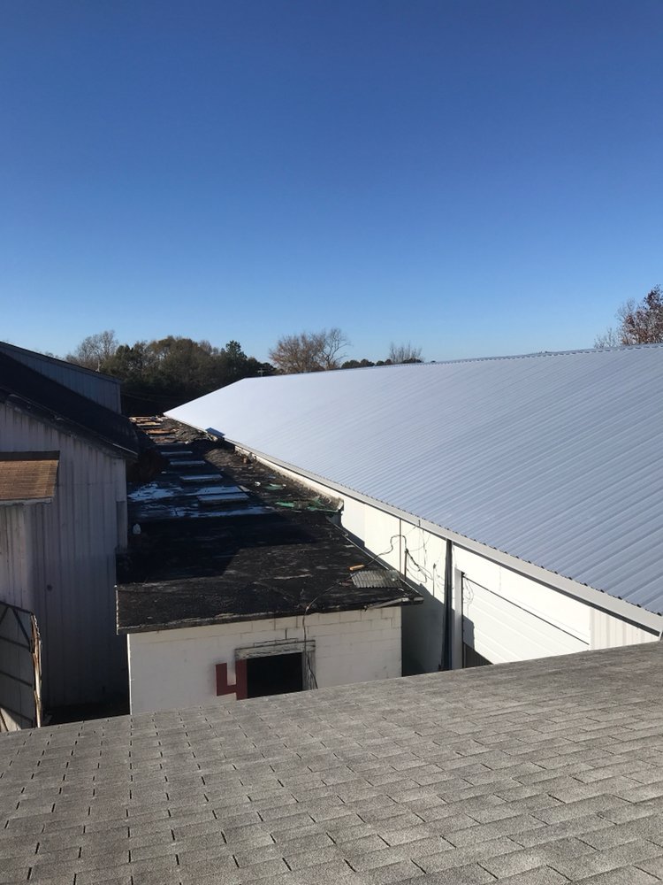 Slide of Carolina Quality Roofing