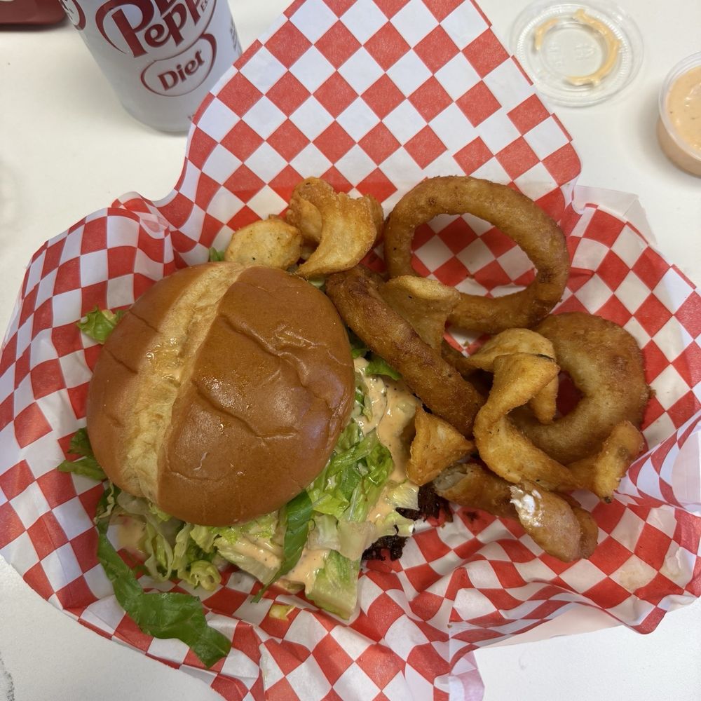 Double Smash Burger with onion rings on the side! Added lettuce as well for the extra cronch. Double Smash Burger with onion rings on the side! Added lettuce as well for the extra cronch.