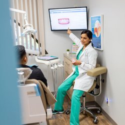 Pepper Tree Dental - Dr Saini explaining the Invisalign process.