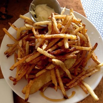 Hillside Farmacy - Malt vinegar fries during happy hour - New American Near Me - Austin, Texas