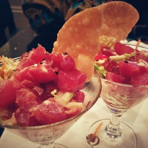 Photo of Fifty Six-Five Restaurant - San Diego, CA, United States. Ahi poke martini (on happy hour menu)