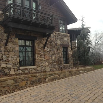 New Beginnings Landscape - a stone house with balcony and balconies - Landscape Architects or Designers Near Me - Nashville, Tennessee New Beginnings Landscape - a stone house with balcony and balconies - Landscape Architects or Designers Near Me - Nashville, Tennessee