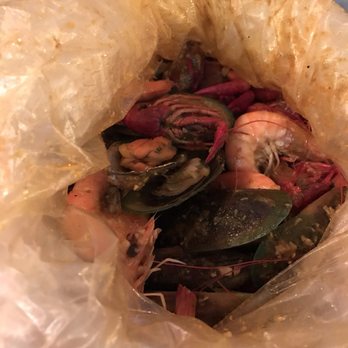 The Crab Pad - 4 lbs (2 lbs of whole shrimp, 1 lb mussels, and 1 lb crawfish) - Seafood Near Me - Chicago, Illinois The Crab Pad - 4 lbs (2 lbs of whole shrimp, 1 lb mussels, and 1 lb crawfish) - Seafood Near Me - Chicago, Illinois