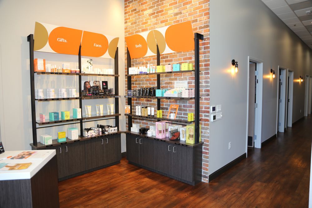 Waxing The City Logo