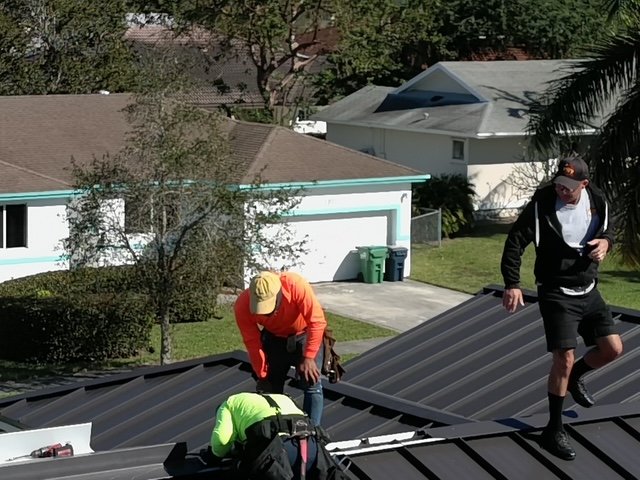 Slide of TNT Roofing