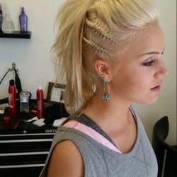 Sarah Brinkerhoff - First I lightened her hair and then I did the style! We were going for a Viking hairstyle!