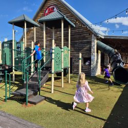 Hat Creek Burger Company - Mom/dad enjoy lunch inside while kiddos use their outside voice in play yard Very warm sunny day.