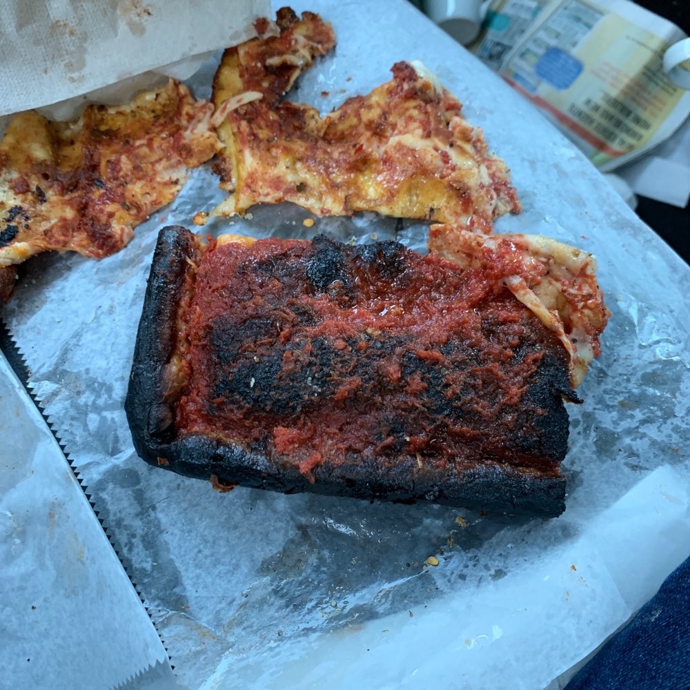 Arinell Pizza - A slice of Sicilian burned then covered with cheese and melted.... WHAT THE HELL ???? - Pizza Near Me - Berkeley, California