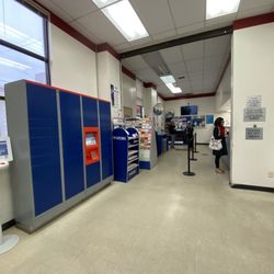 US Post Office - Postal lockers and the que for tellers.