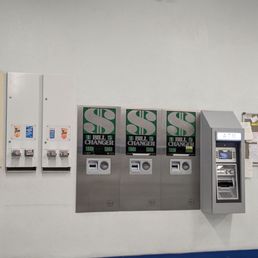 ATM, coin exchange machines, and dispensers for detergent and other items. ATM, coin exchange machines, and dispensers for detergent and other items.