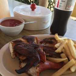 Super Pollo - The Media Pollo with fries, tortillas, and a Coke!