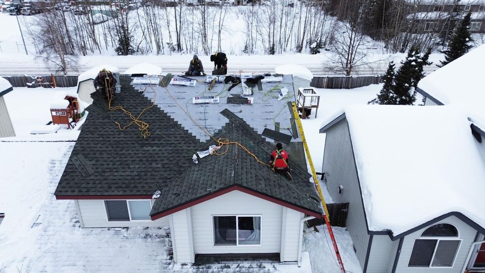 Slide of Reds Roofing & Renovations