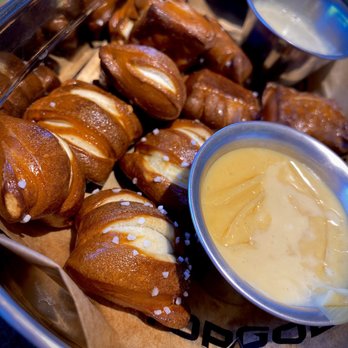 Topgolf - Pretzel bites with cheese sauce and mustard dipping sauces - New American Near Me - Fort Worth, Texas