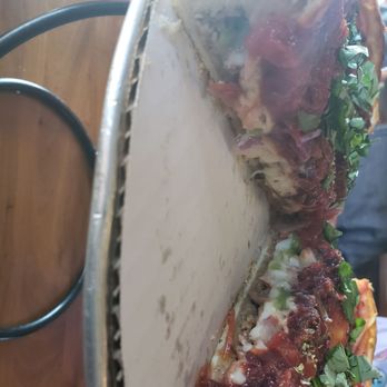 Patxi's Pizza - Side view of deep dish pizza. - Pizza Near Me - Dublin, California Patxi's Pizza - Side view of deep dish pizza. - Pizza Near Me - Dublin, California