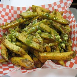 K & L Gyros & More - Greek Fries- russet potatoes fried until golden brown. Topped with an herbaceous seasoning with olive oil, lemon juice and feta cheese!