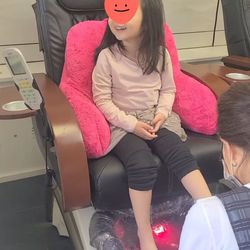 Bellini Nail & Spa - My daughter is having a pedicure done by the nail technician.