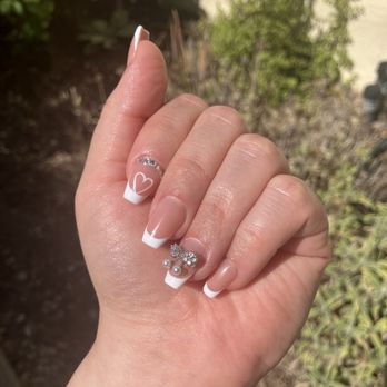 Sun Nail - Gel X with French tip design & charm - Nail Salons Near Me - Pasadena, California Sun Nail - Gel X with French tip design & charm - Nail Salons Near Me - Pasadena, California