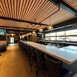 Colorado Plus Brew Pub - Colorado Plus - Wide windows that bring in natural light, creating a warm and inviting atmosphere