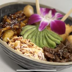 The Escobar Kitchen Latin Asian fusion - Escobar poke bowl
Filet migno, Krab,shrimp,sweet plaintain, avocado in a bed of white rice