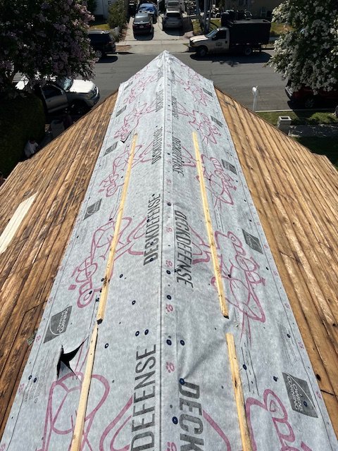 Slide of MMM Roofing