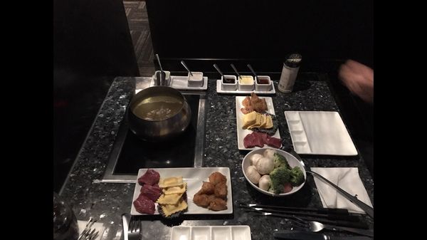 Photo of The Melting Pot - Buffalo, NY, US. Entree with filet, ravioli, chicken, vegetables etc. the dipping sauces are the best part!