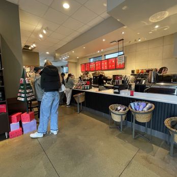 Starbucks - a woman standing in a coffee shop - Coffee & Tea Near Me - Roseburg, Oregon Starbucks - a woman standing in a coffee shop - Coffee & Tea Near Me - Roseburg, Oregon