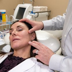 Rejuvené MedSpa & Wellness Center - Dr. Reed prepping for a PDO thread treatment