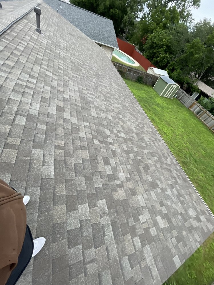 Slide of Stallion Roofing Company