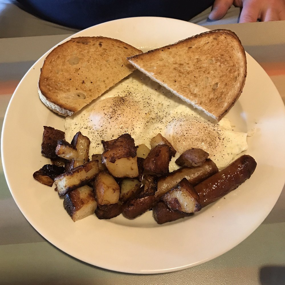 Eggs over easy, spuds, sausage links & toast. All very good. Eggs over easy, spuds, sausage links & toast. All very good.