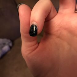 Diva Nails Salon - I know it's grown out but she never put acrylic or paint on this side of my finger..