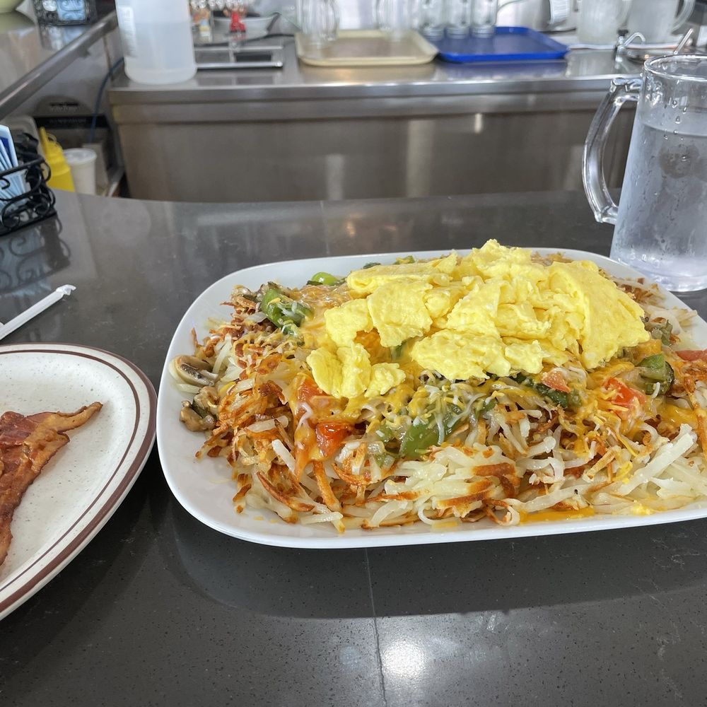 This is the Veggie Skillet. I had already eaten two rashers of bacon. Clean, well run, friendly staff, good food. This is the Veggie Skillet. I had already eaten two rashers of bacon. Clean, well run, friendly staff, good food.
