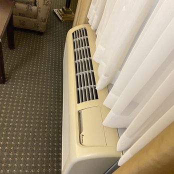 Wingate By Wyndham Peoria - The cover on the heater by TV room was decent. - Hotels Near Me - Peoria, Illinois Wingate By Wyndham Peoria - The cover on the heater by TV room was decent. - Hotels Near Me - Peoria, Illinois