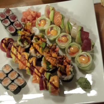 Ikko Sushi - Left to right: love roll, East-West highway roll, silver spring roll, and rainbow roll - Sushi Bars Near Me - Silver Spring, Maryland Ikko Sushi - Left to right: love roll, East-West highway roll, silver spring roll, and rainbow roll - Sushi Bars Near Me - Silver Spring, Maryland