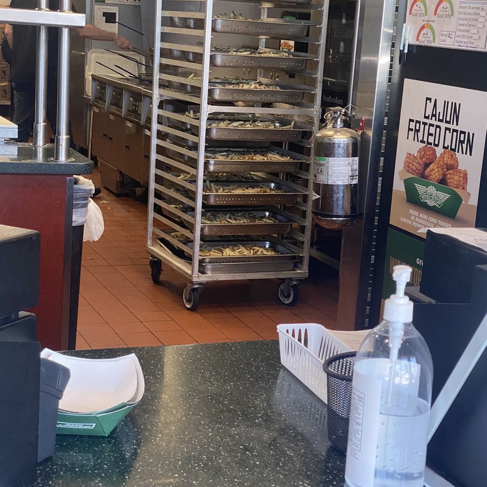 Wingstop - Cooked fries sitting out - Chicken Wings Near Me - Rancho Cucamonga, California Wingstop - Cooked fries sitting out - Chicken Wings Near Me - Rancho Cucamonga, California