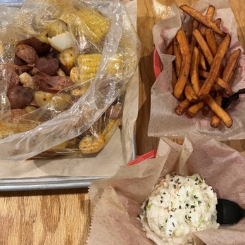 Savannah Seafood Shack - Our Famous Lowcountry Boil, side of cold slow and sweet potato fries. - Seafood Near Me - Savannah, Georgia