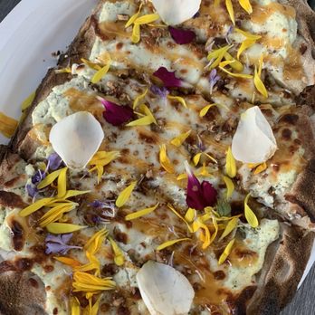 Serendipity Cellars - Pretty pizza with flower petals on it. Didn't eat any. - Wine Tasting Room Near Me - Brentwood, California