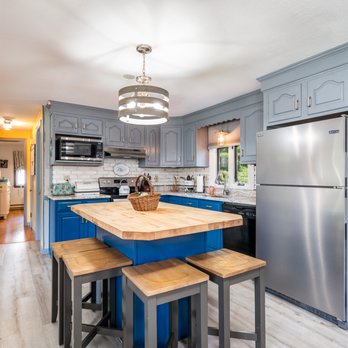 Witman Properties - a kitchen with a chalkboard wall - Property Management Near Me - Holyoke, Massachusetts