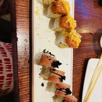 Japan House - The one with the black fish eggs is a smoked salmon...DELICIOUS - Sushi Bars Near Me - North Richland Hills, Texas