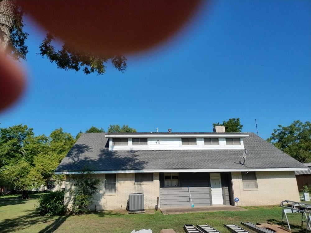 Slide of Estate Roofing