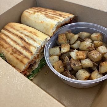 Our Happy Place Cafe - Pesto Chicken Panini - served hot - Sandwiches Near Me - Corona, California Our Happy Place Cafe - Pesto Chicken Panini - served hot - Sandwiches Near Me - Corona, California