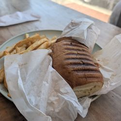 Gluten free chicken parm sandwich and seasoned fries