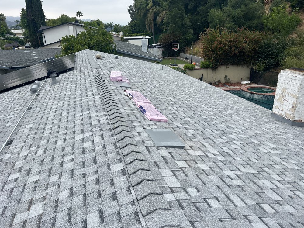 Slide of Twins Roofing