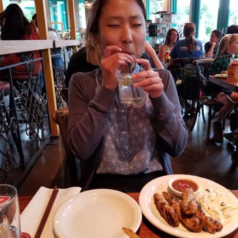 Ba Bar - My friend being zinged by tonic water and her chicken skewer appetizers - Vietnamese Near Me - Seattle, Washington Ba Bar - My friend being zinged by tonic water and her chicken skewer appetizers - Vietnamese Near Me - Seattle, Washington