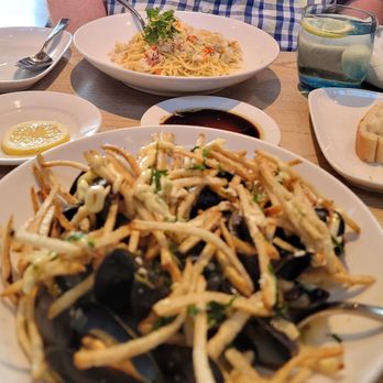 Pasta Moon - House made linguine with Alaskan Dungeness crab up top and mussels at bottom - Italian Near Me - Half Moon Bay, California
