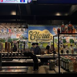 Gloria Sports & Spirits - Bar with mural